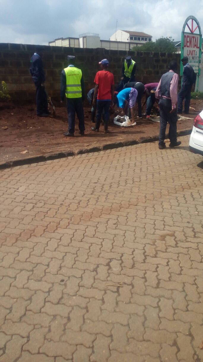 Kenyan site workers and engineers on a job